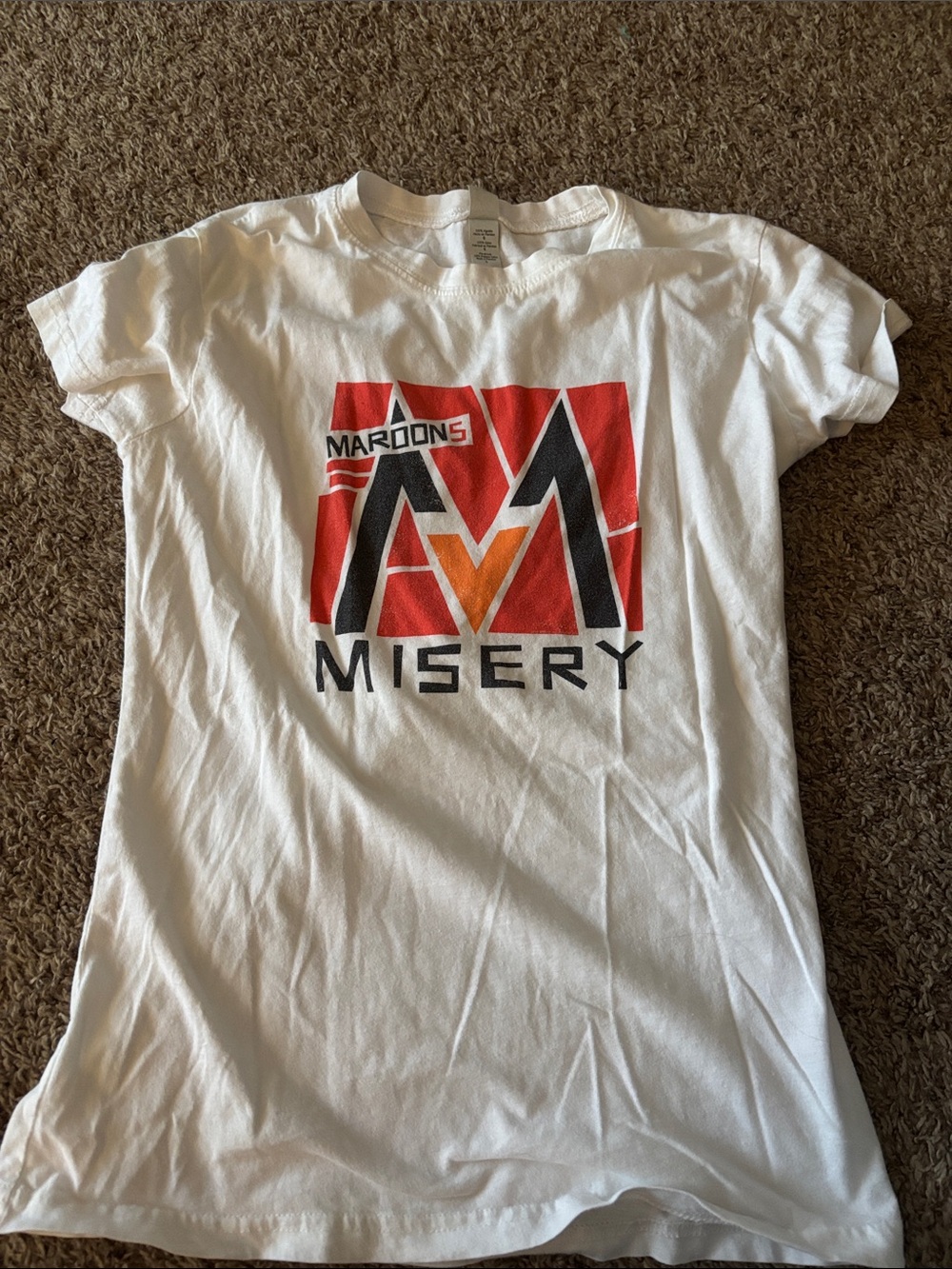Maroon5 concert T-shirt says large fits like fitted woman’s small